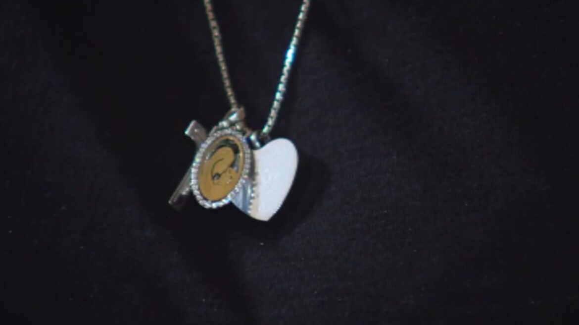 heart-shaped necklace containing sons ashes