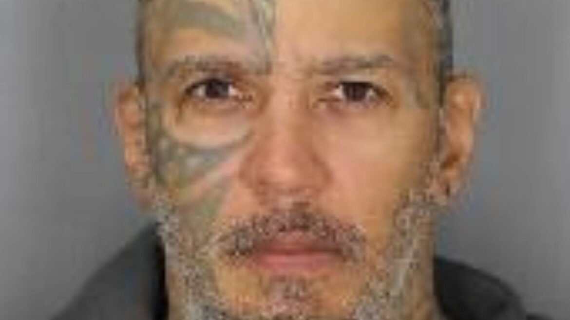 Mugshot-style image of Matthew Donald Adlam, 52, arrested by Durham Regional Police after alleged indecent acts on DRT bus in Oshawa